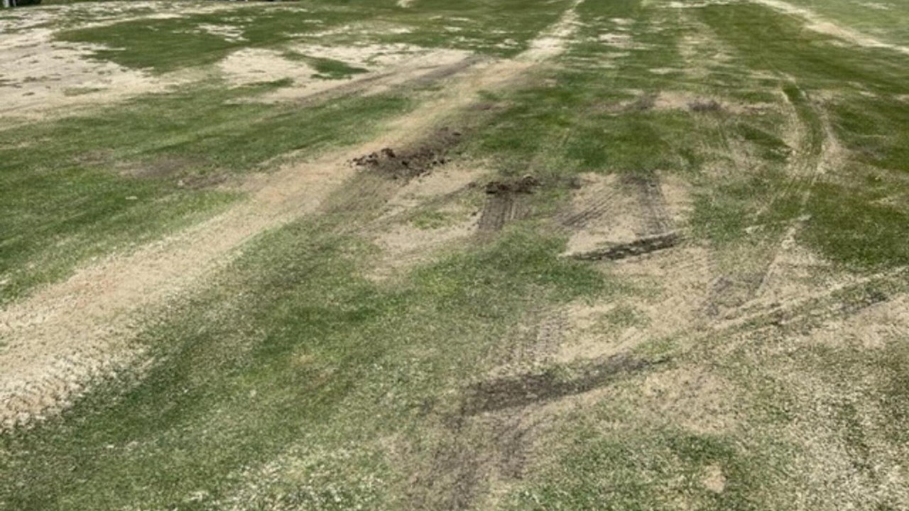 Shining Rock GC’s Acorn course fairway in Northbridge, MA with visible turf damage, tire tracks, and patchy grass areas